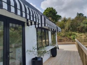 Tiny house with greenhouse dining